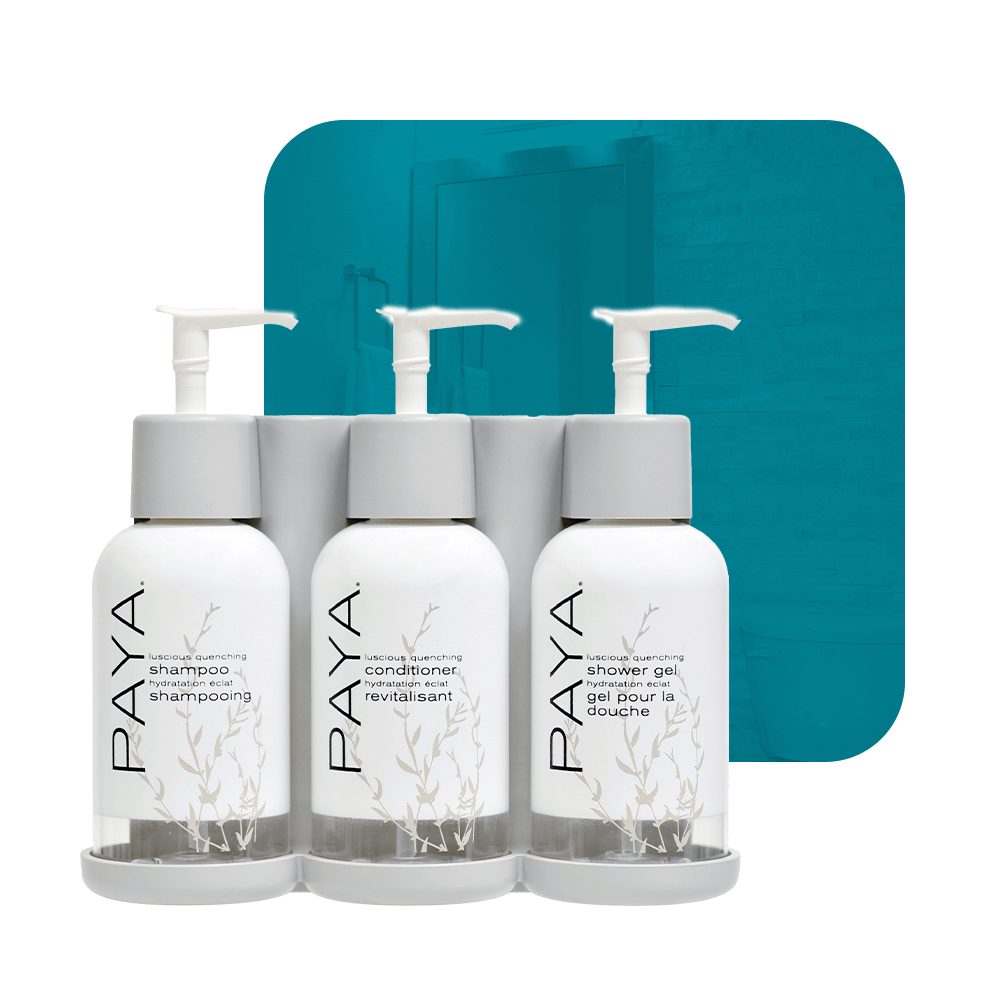 photo of paya three-chamber wall-mounted hotel dispenser set, with individual units for Shower Gel, Shampoo, and Conditioner.