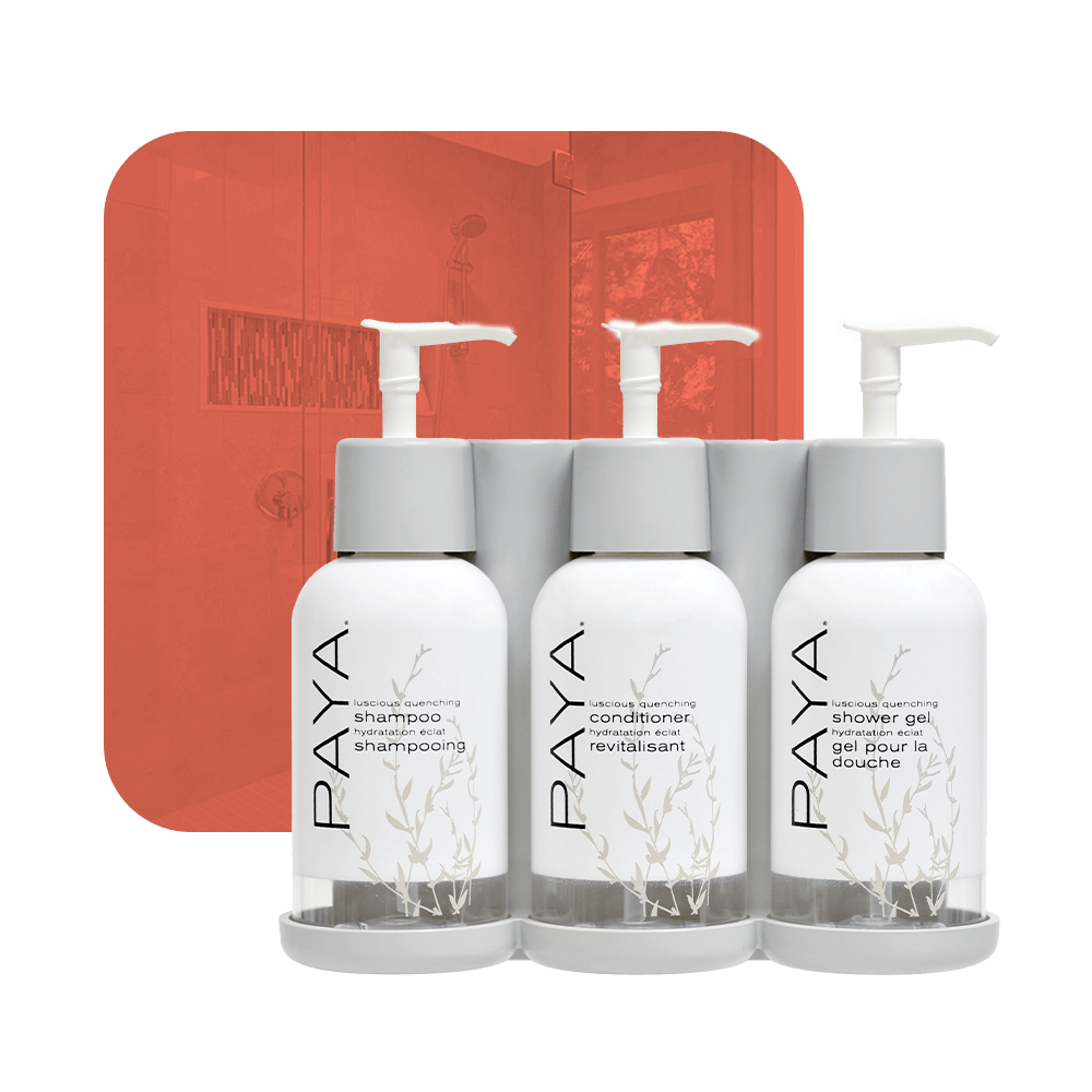 photo of paya three-chamber wall-mounted hotel dispenser set, with individual units for Shower Gel, Shampoo, and Conditioner.